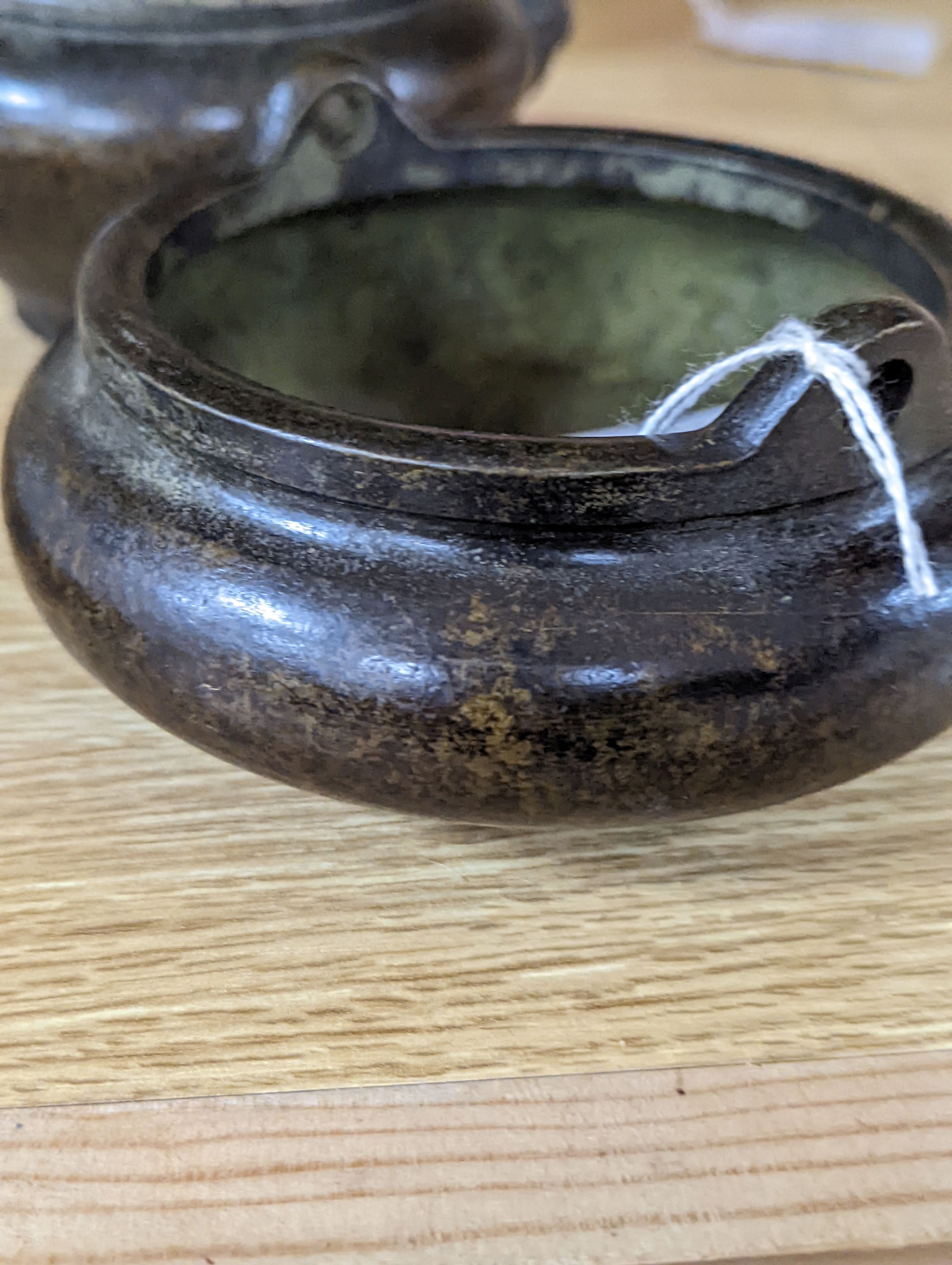 A Chinese bronze tripod censer and a Chinese bronze censer and cover 11cm